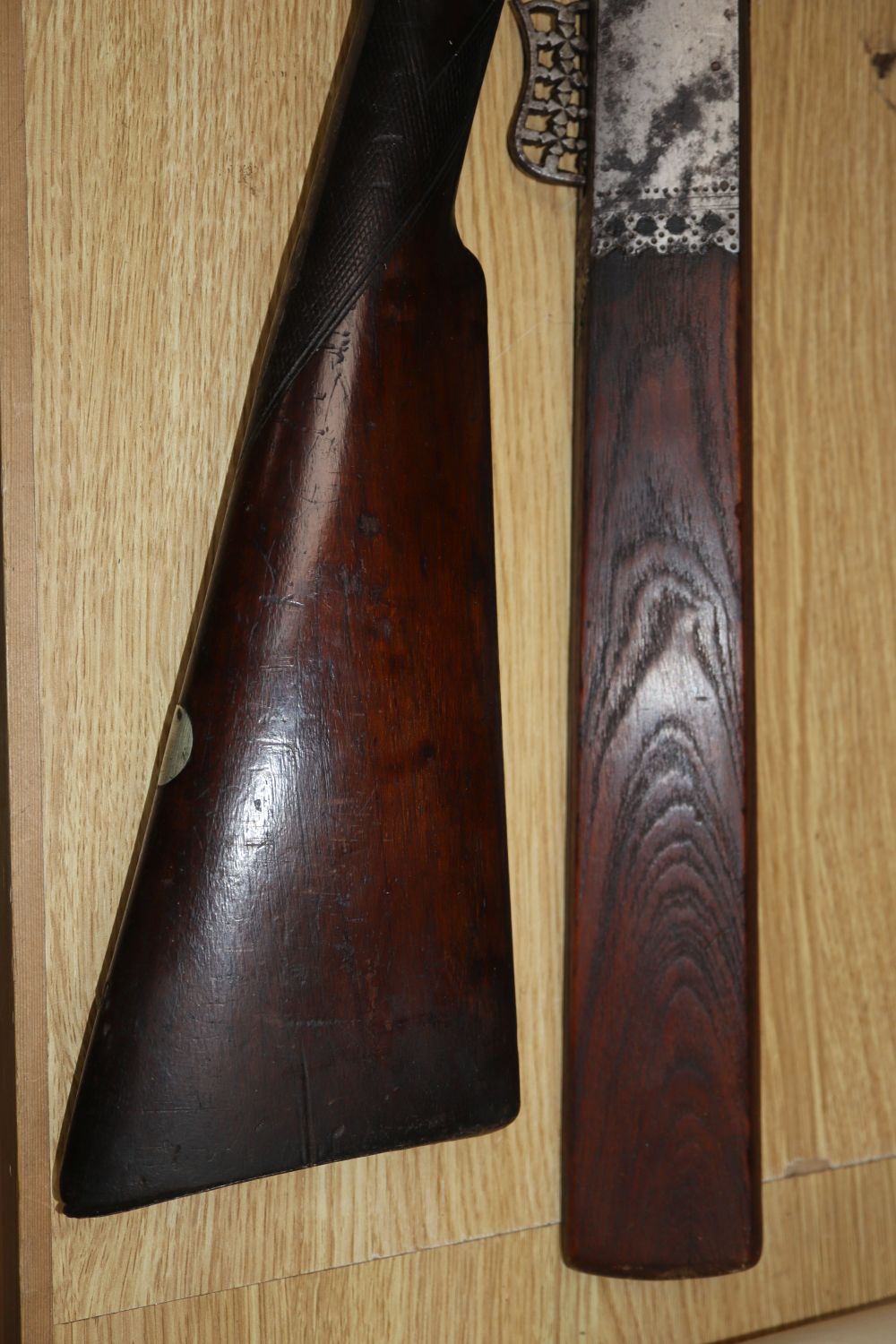A 19th century percussion cap musket and an Eastern musket